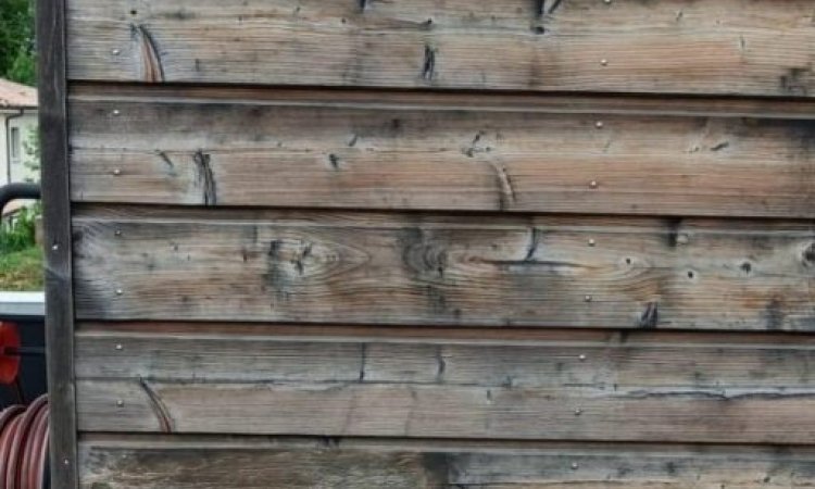 Réparation d'un bardage en bois